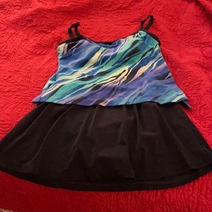 Nearly new condition, one piece skirted style.